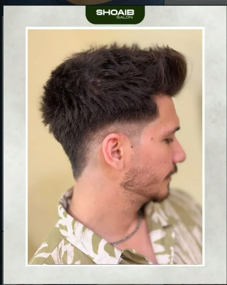 Textured quiff with a taper fade, cut at Shoaib Salon