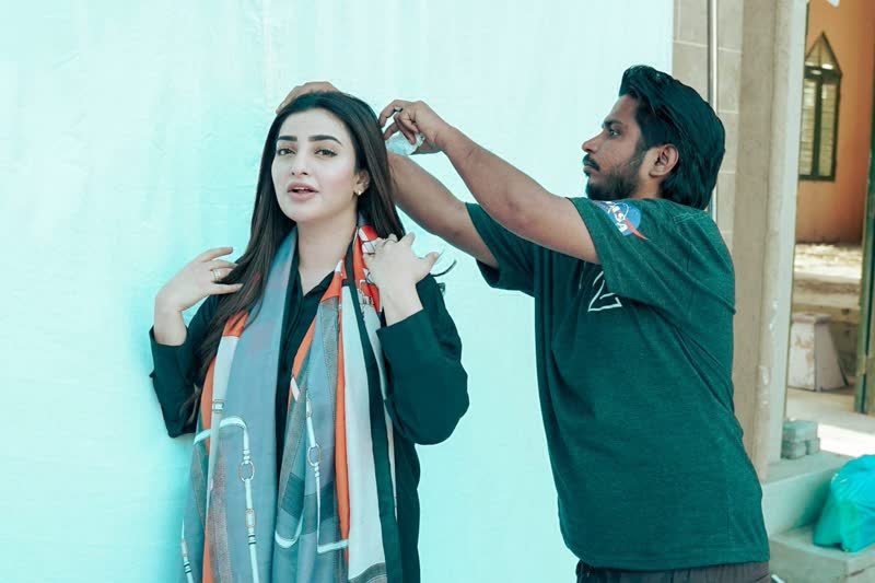 Shoaib Bashir with a client at Shoaib Salon