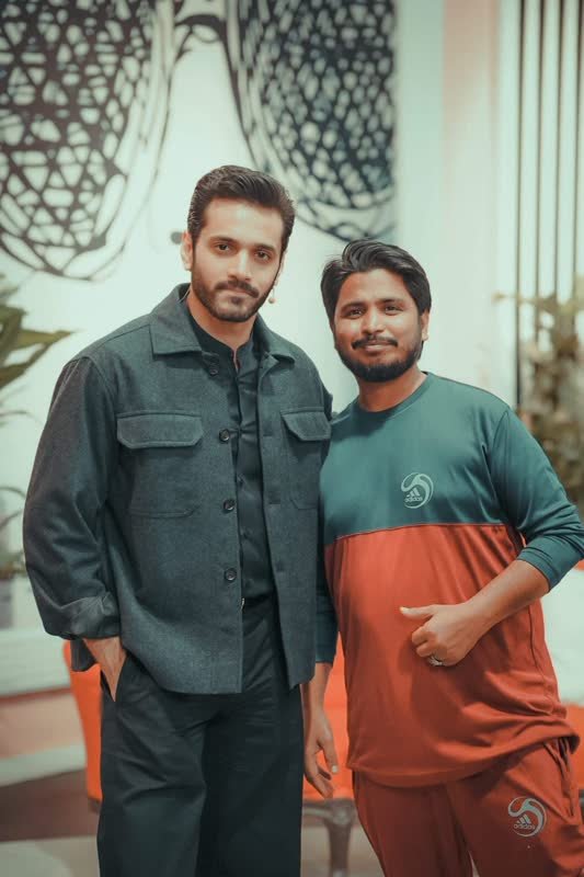 Shoaib Bashir with a client at Shoaib Salon