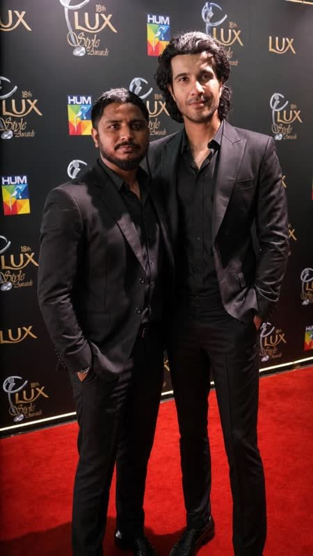 Shoaib Bashir with a client at Shoaib Salon