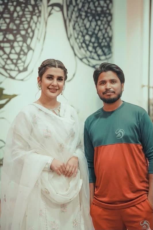 Shoaib Bashir with a client at Shoaib Salon