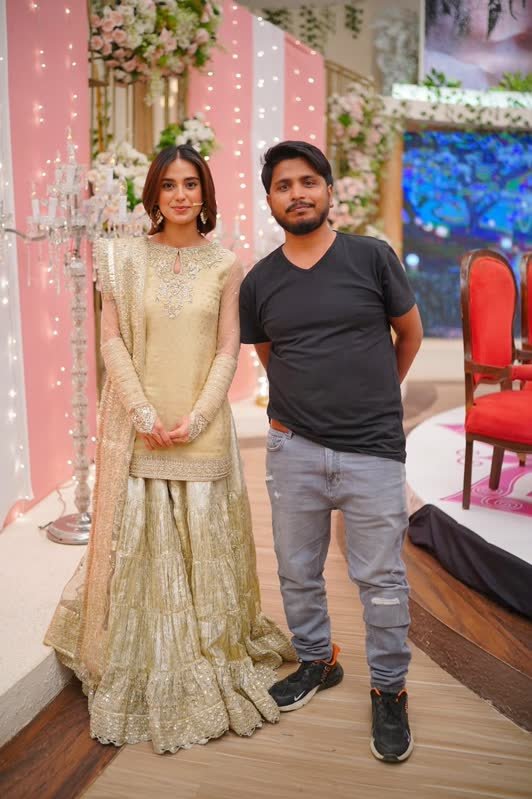 Shoaib Bashir with a client at Shoaib Salon