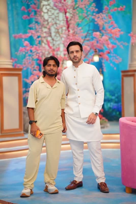 Shoaib Bashir with a client at Shoaib Salon