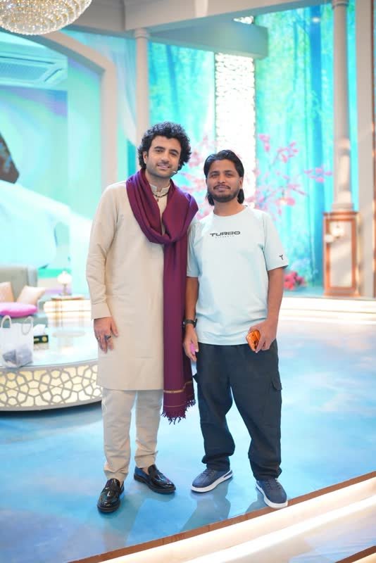Shoaib Bashir with a client at Shoaib Salon