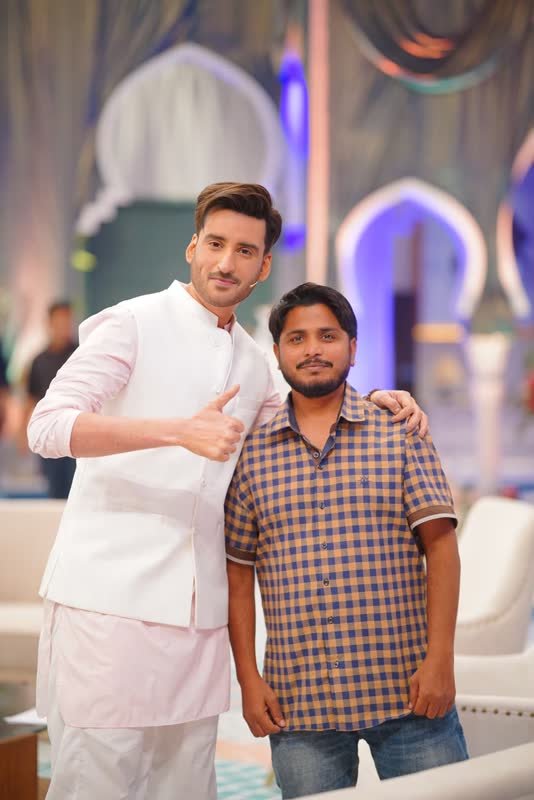 Shoaib Bashir with a client at Shoaib Salon