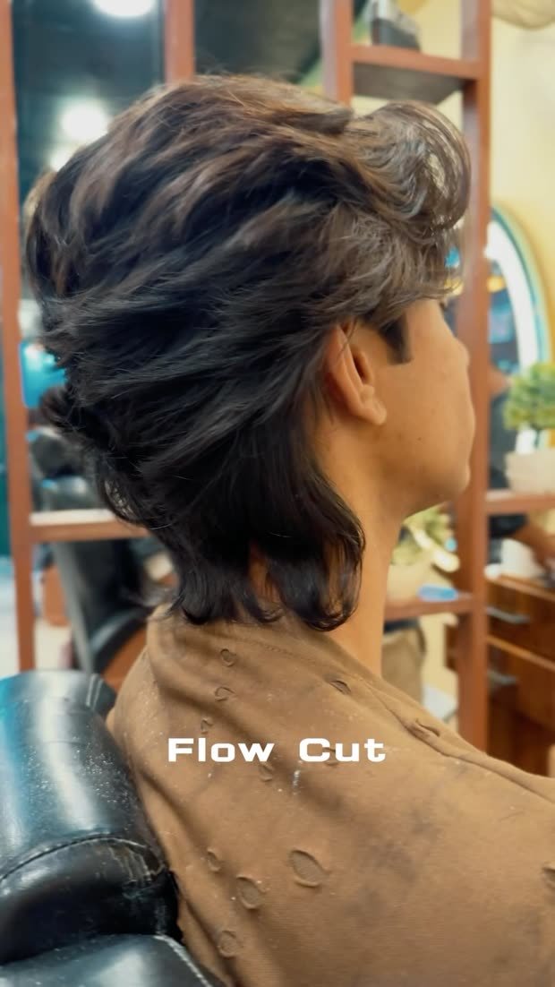 Reel: a long layered flow cut, styled at Shoaib Salon